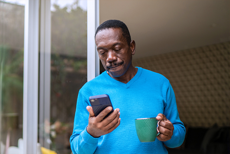 man looking at a phone