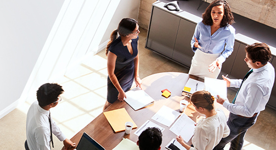 team meeting at desk