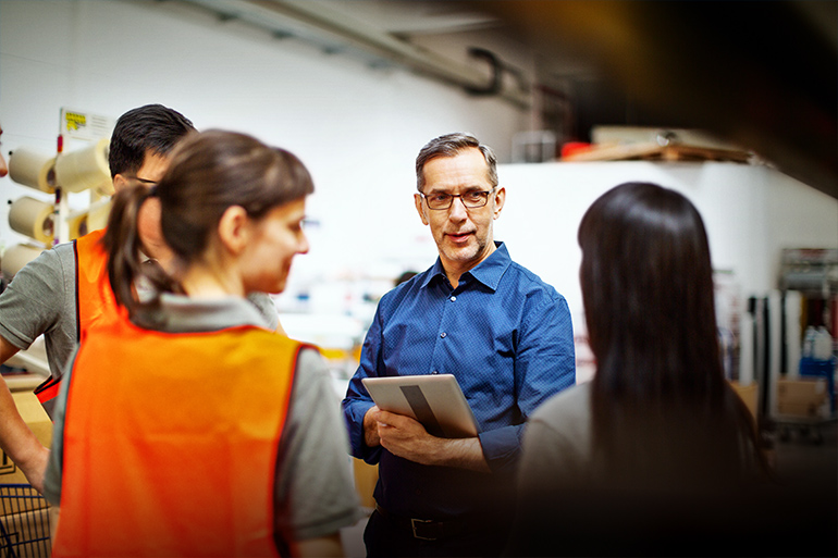 group of people in work setting