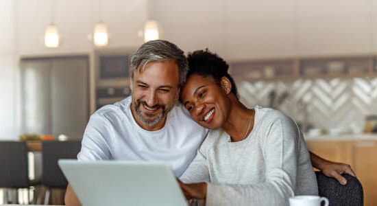 couple working on laptop