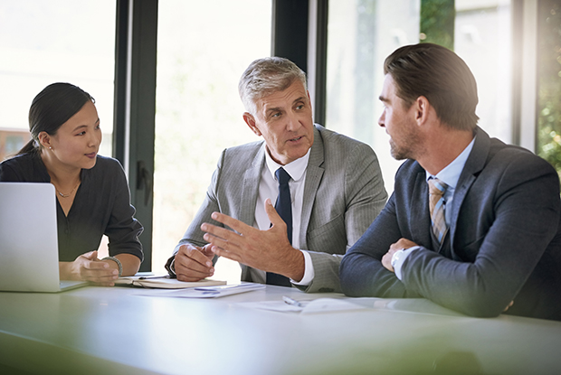 people gathered around a conference table