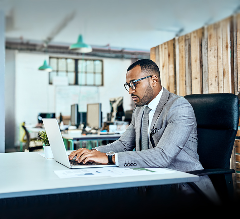 man using laptop